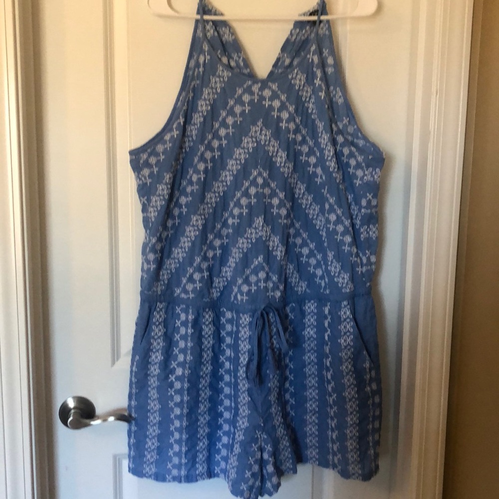 Blue and white embroidered romper.